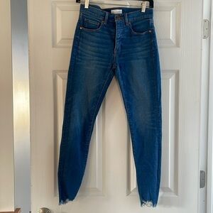 Light washed jeans, distressed at the bottom skinny crop